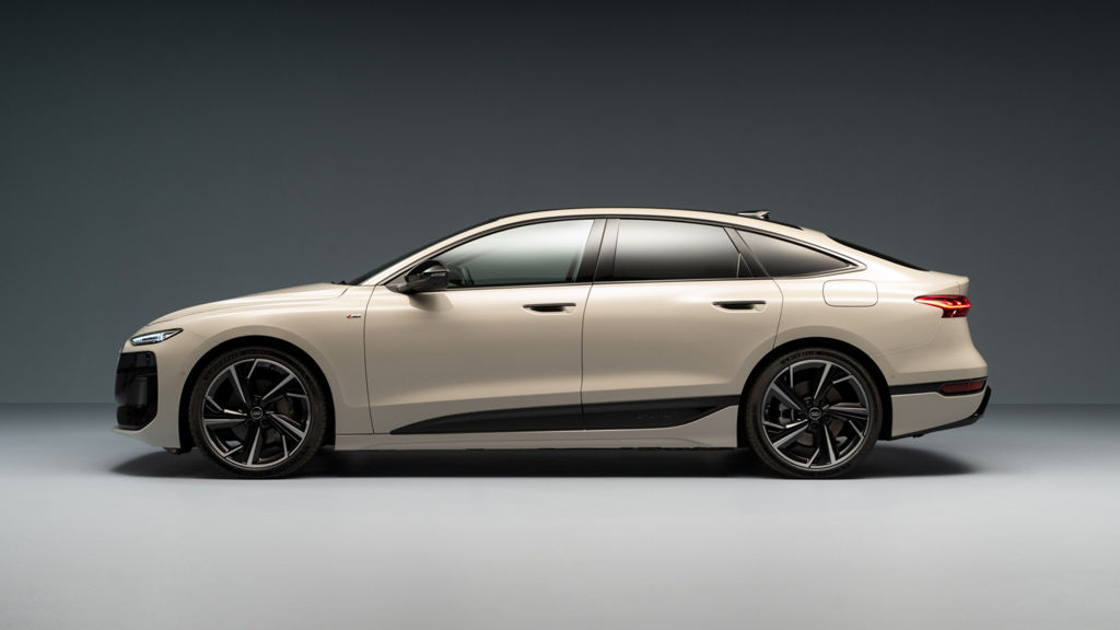Side view of the Audi A6 Sportback e-tron. The rear windows are darkened. The vehicle is standing against a monochrome background.