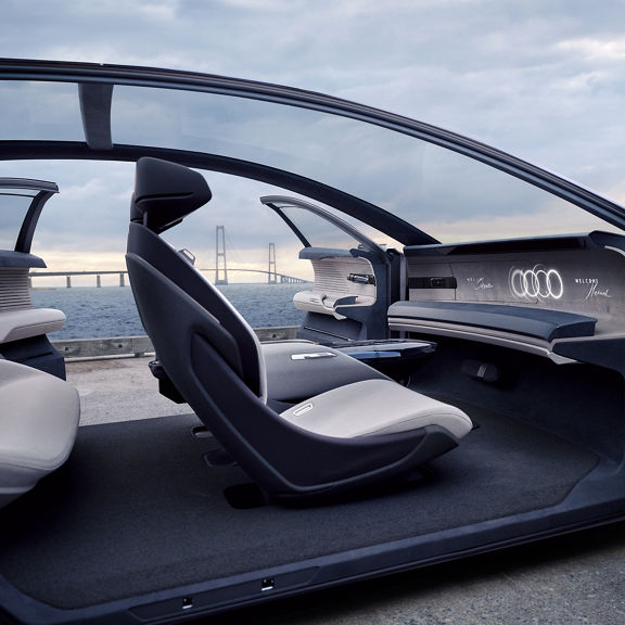 Side view of the Audi grandsphere concept cockpit in automated driving mode.
