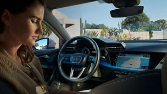 Dame i Audi
