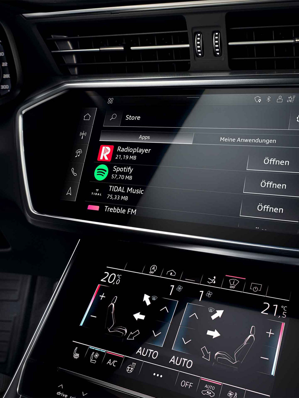 Close-up of an MMI screen in an Audi vehicle. 