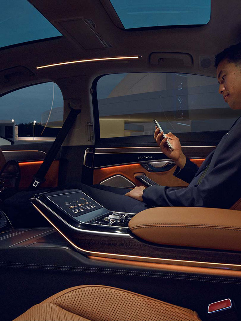 Man enjoys the space in the rear of the Audi A8 L
