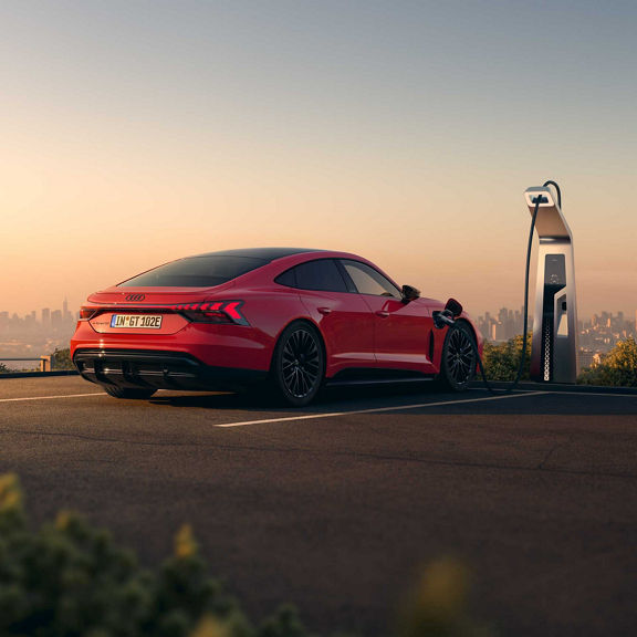 Audi e-tron GT quattro side view during charging