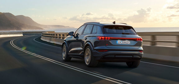 Dynamic rear view Audi Q6 SUV e-tron