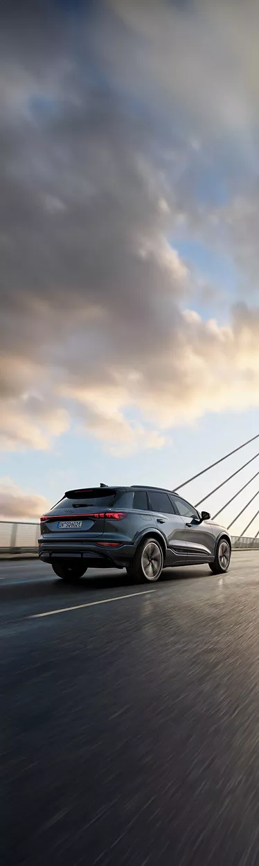 Dynamic rear view Audi SQ6 SUV e-tron