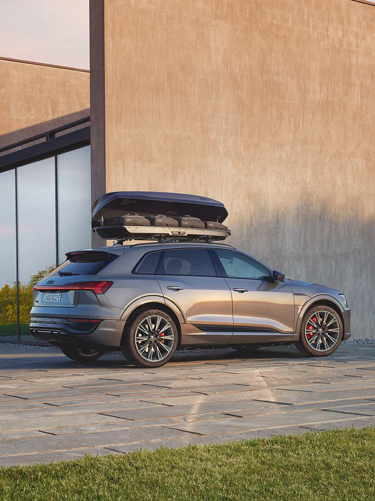 Side view Audi Q8 e-tron with roof box