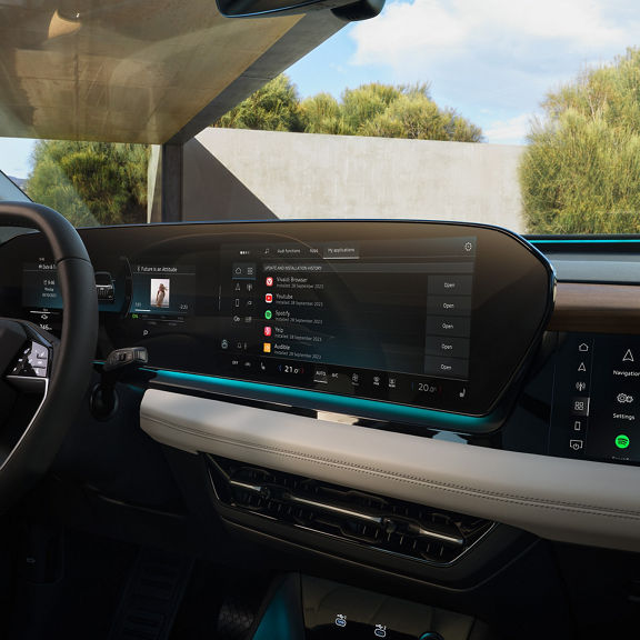 Man in the Audi taps on the Audi display