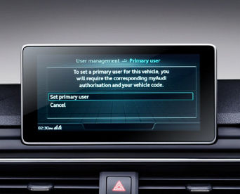 An Audi dashboard screen displaying the 'User Management' screen with 'Set primary user' selected