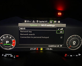 An Audi dashboard screen displaying Wi-Fi settings with 'Wi-Fi' selected