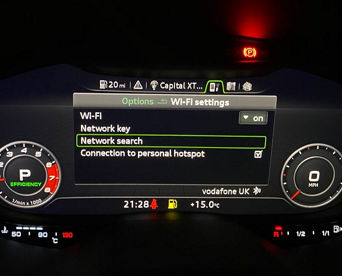 An Audi dashboard screen displaying Wi-Fi settings with 'Network search' selected