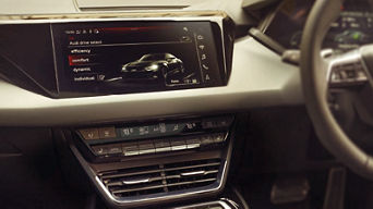 The digital display of an Audi electric vehicle displaying the driving efficiency modes