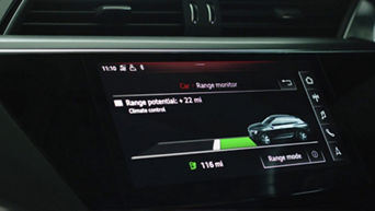 Close up of a dashboard display showing range monitor calculating the range