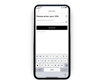 The myAudi app displaying the screen to add your VIN, either via a photo or text entry