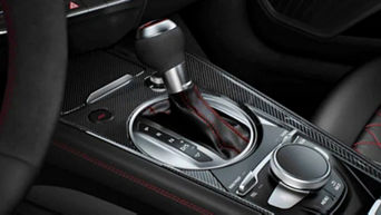 Close up of the gear stick inside of an Audi vehicle