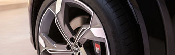 Cropped shot of an Audi front wheel with the rim and brake disc in view