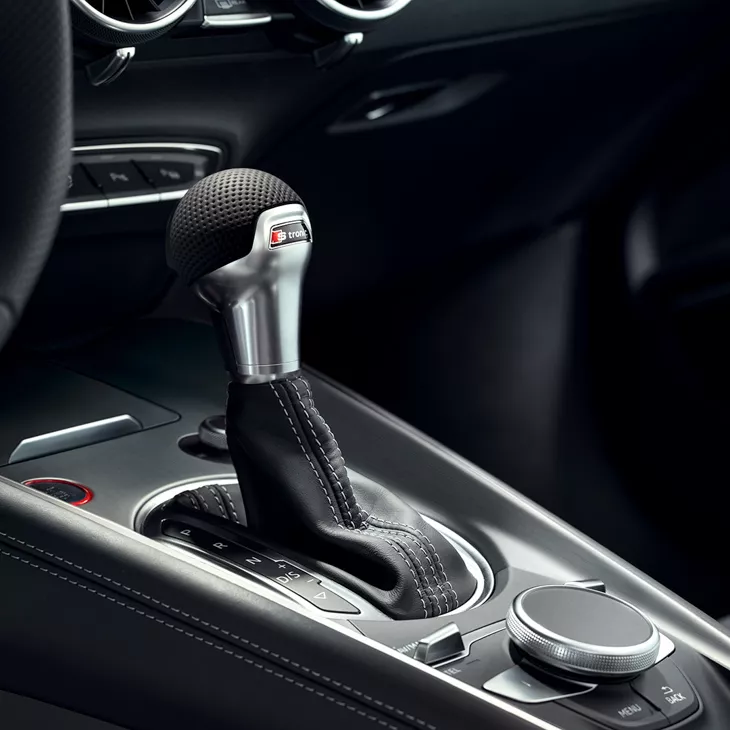 Interior view of black and silver gear stick inside Audi TT.