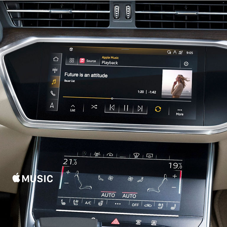 In-car entertainment system displaying Apple Music interface with climate controls below.