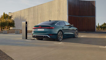 Car charging at a modern charging station.