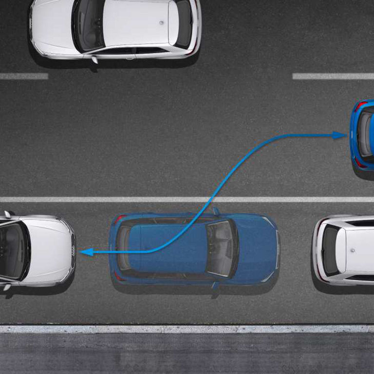 Aerial view of a blue car parallel parking between two white cars.