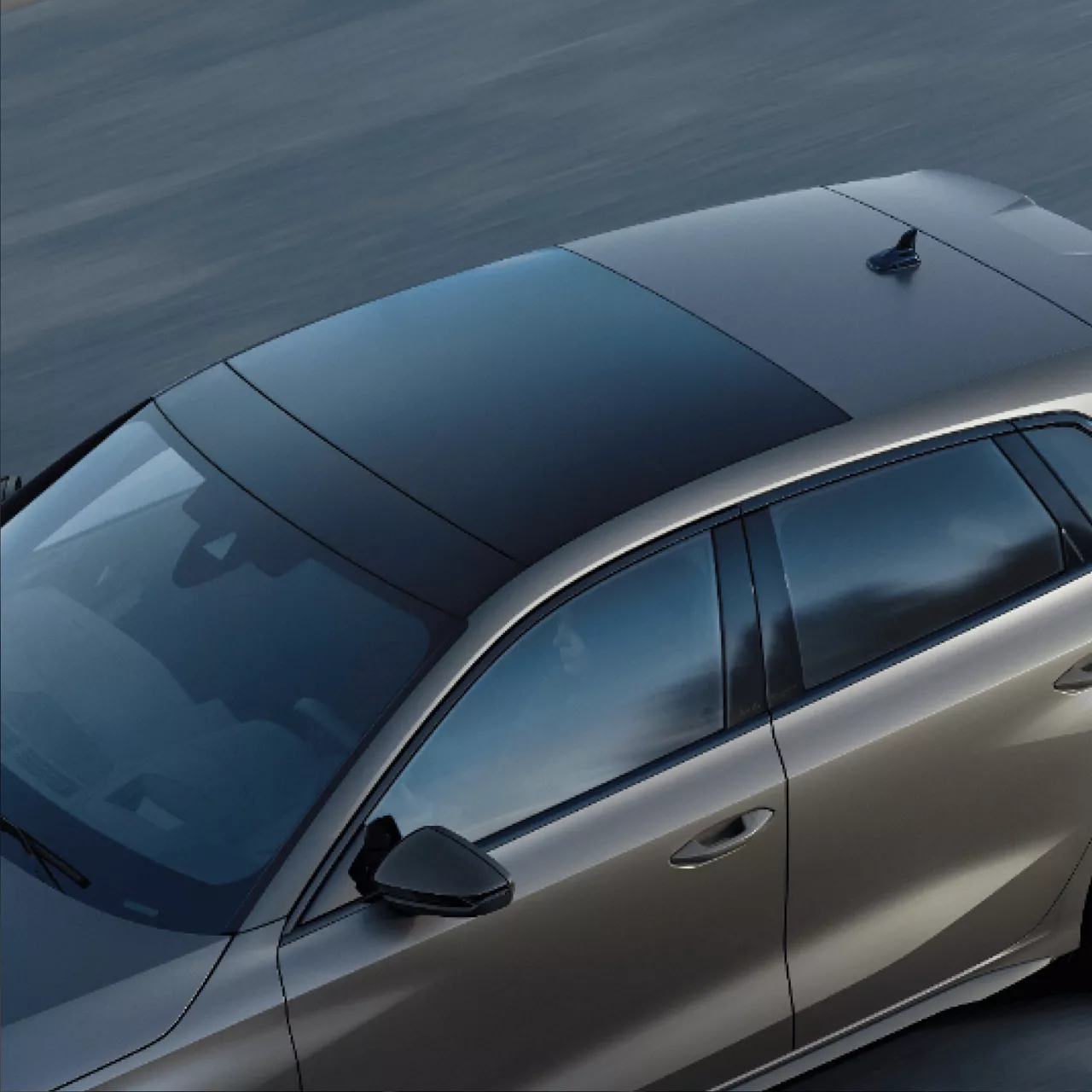  A top view of a grey Audi S3 car driving on a road.