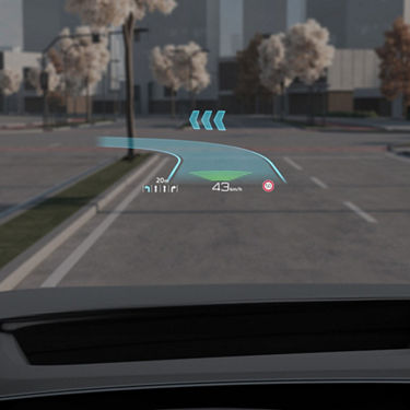 Head-up display in a car showing speed at 43 km/h and navigation cues.